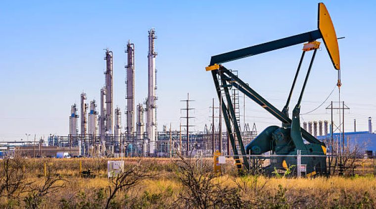 A pumpjack (oil derrick) and oil refinery in Seminole, West Texas. Organic 11th - Revision { GOC & Hydrocarbon } by k2h